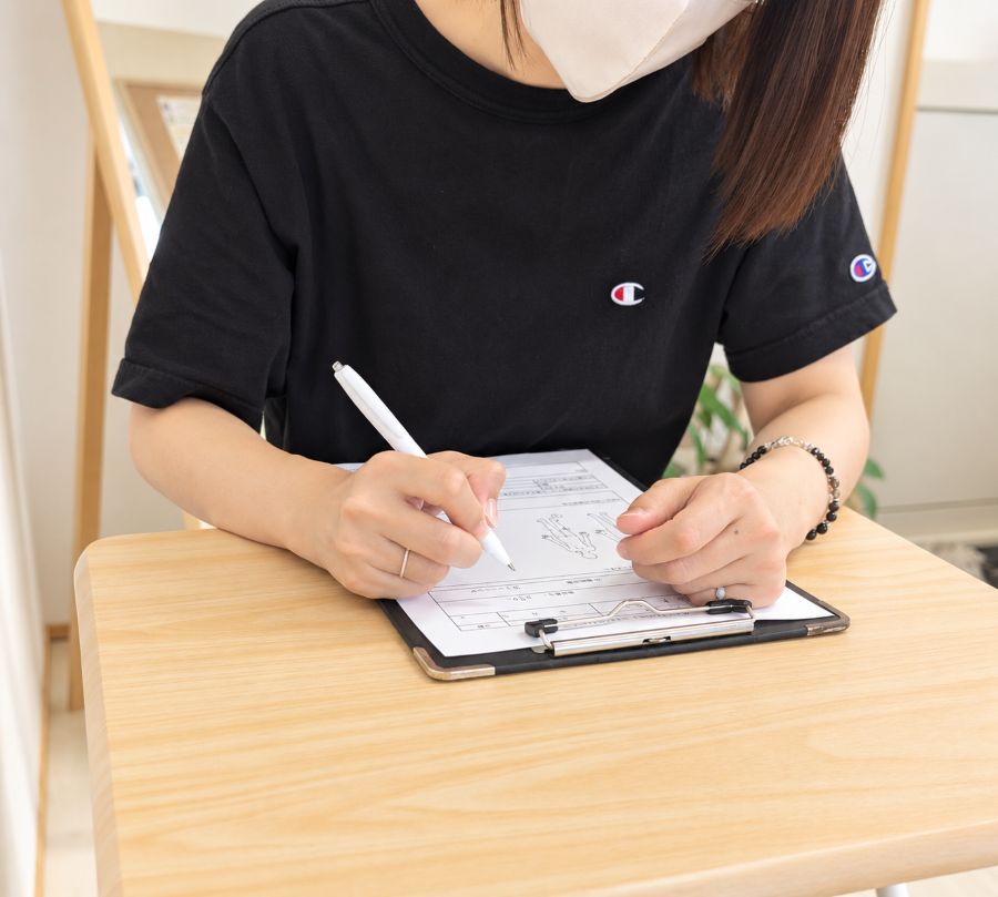 整体ジムRe:luckで相談しながら進める様子